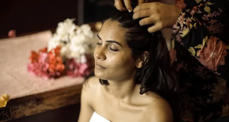 Apply your hot water mix to the small section of hair